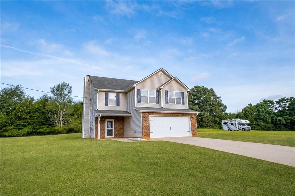 4 bedroom, 3 bathroom, 1,836 sq ft single family residence for sale at 315 Furrow Creek Court, Jackson, GA 30233 — photo 2