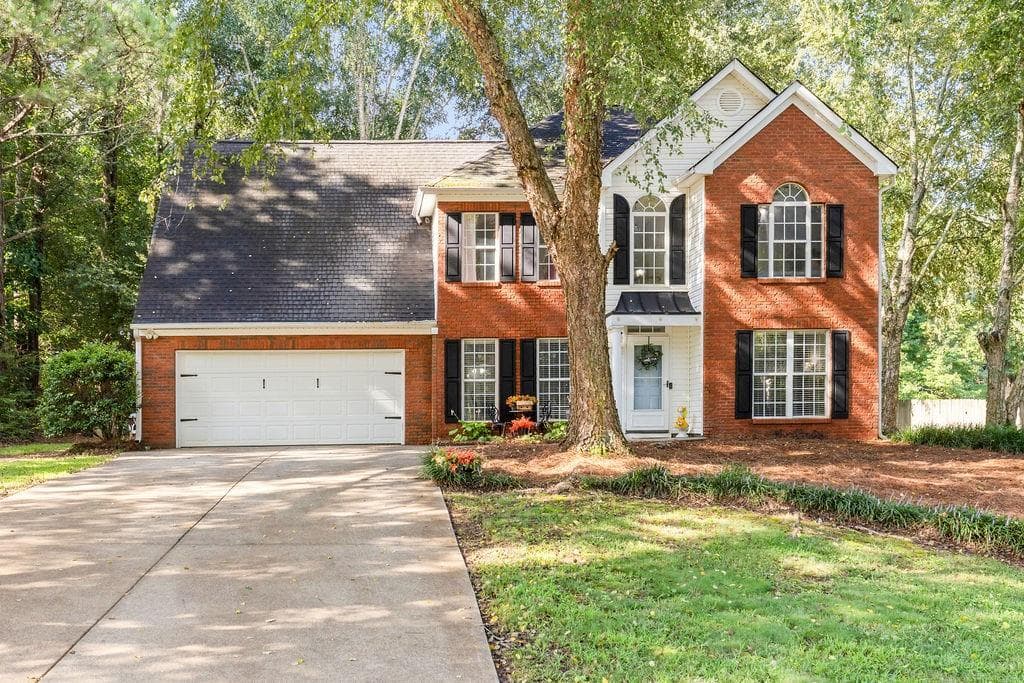 4 bedroom, 3 bathroom, 2,423 sq ft single family residence for sale at 6445 N Glen Drive, Cumming, GA 30028
