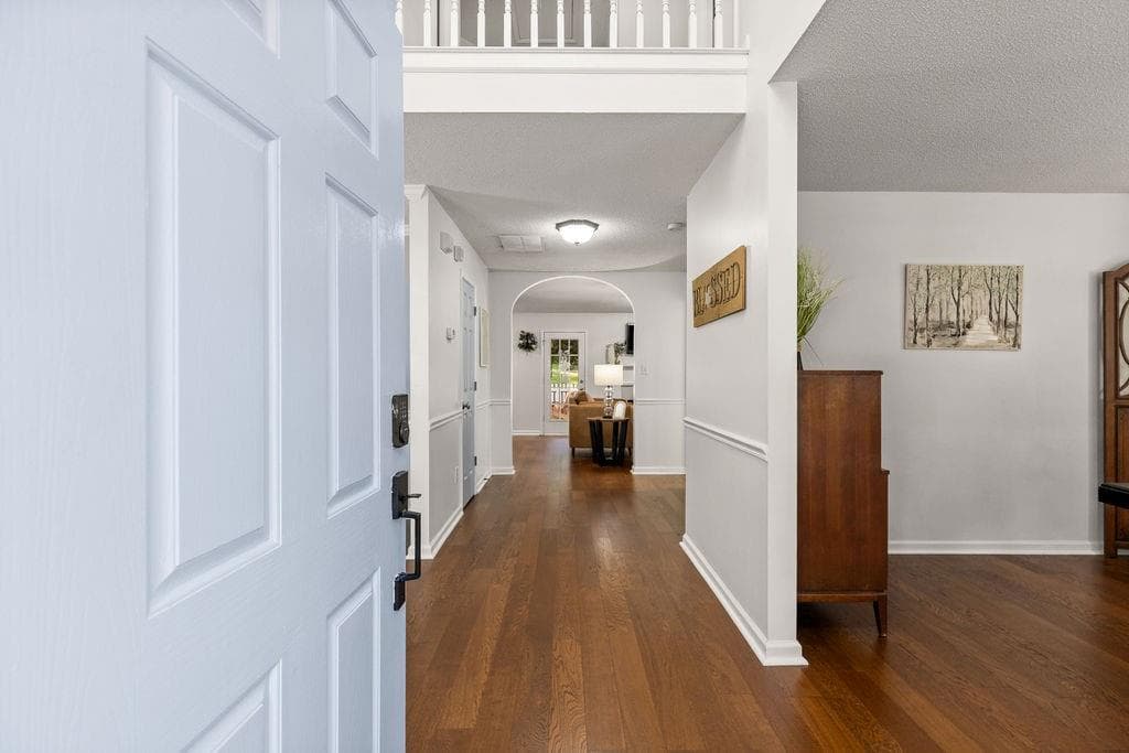 4 bedroom, 3 bathroom, 2,423 sq ft single family residence for sale at 6445 N Glen Drive, Cumming, GA 30028 — photo 2