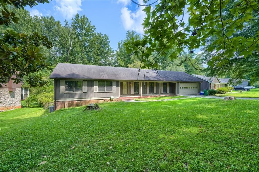 4 bedroom, 3 bathroom, 3,428 sq ft single family residence for sale at 4634 S Hope Springs Road, Stone Mountain, GA 30083 — photo 2