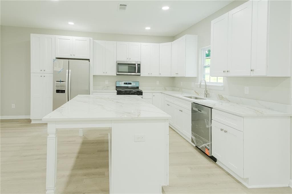 4 bedroom, 3 bathroom, 2,400 sq ft single family residence for sale at 135 Harriette Drive, Stockbridge, GA 30281 — photo 6