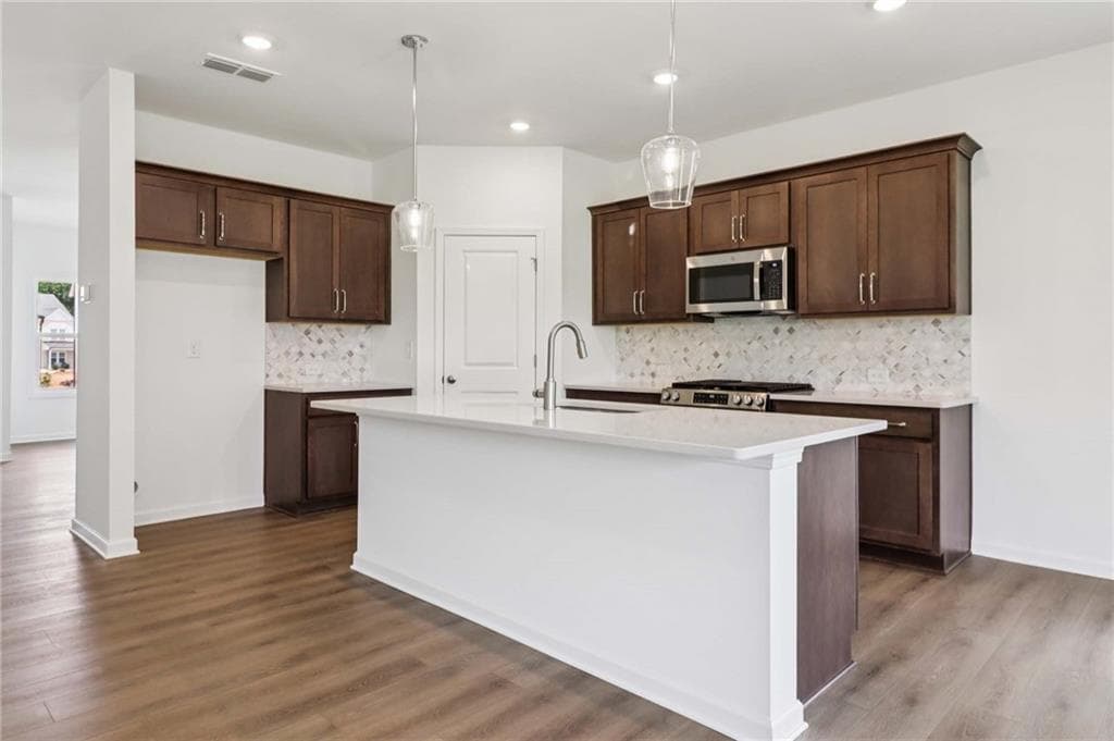 5 bedroom, 4 bathroom, 2,801 sq ft single family residence for sale at 5347 Callahan Trace, Flowery Branch, GA 30542 — photo 8