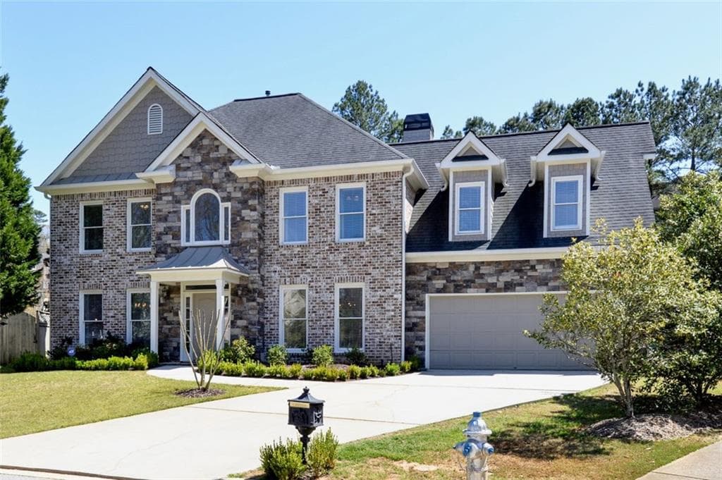 4 bedroom, 3 bathroom, 3,361 sq ft single family residence for rent at 310 Windsor Gate Cove, Atlanta, GA 30342 for $5,400 a month — photo 2