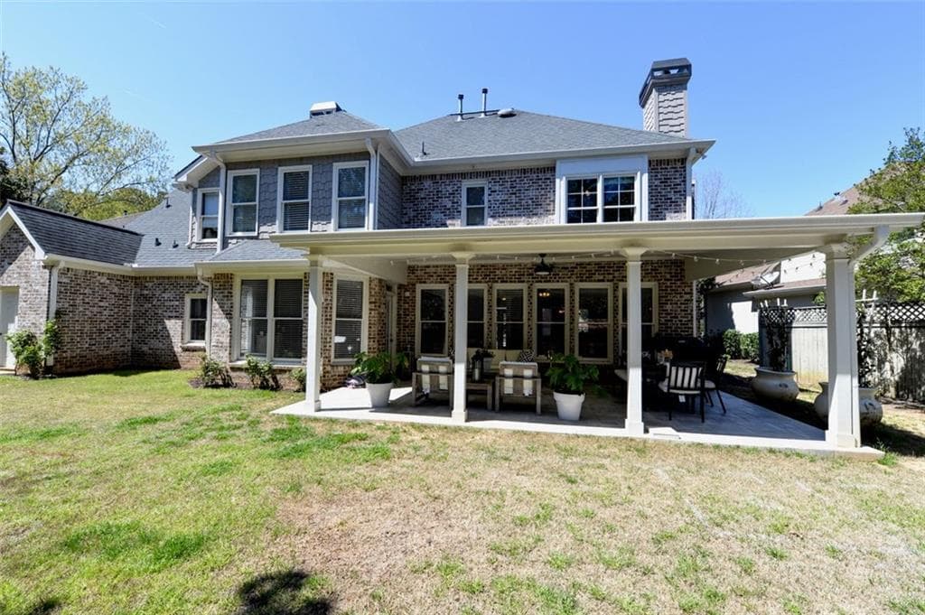 4 bedroom, 3 bathroom, 3,361 sq ft single family residence for rent at 310 Windsor Gate Cove, Atlanta, GA 30342 for $5,400 a month — photo 6