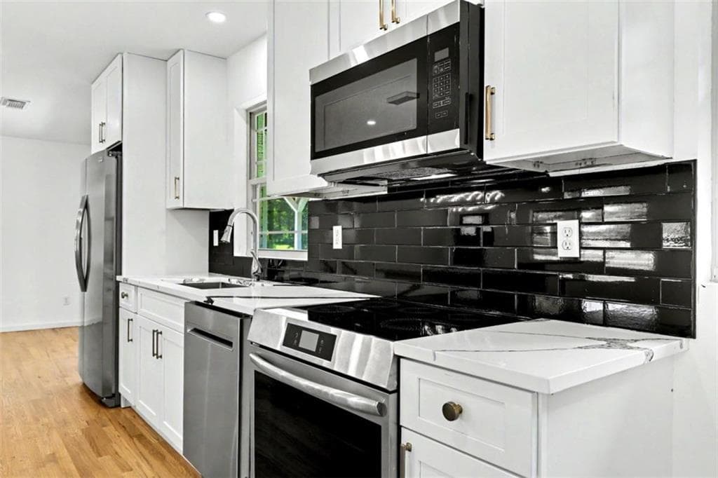 3 bedroom, 2 bathroom single family residence for sale at 6260 Walker Road, Riverdale, GA 30296 — photo 6