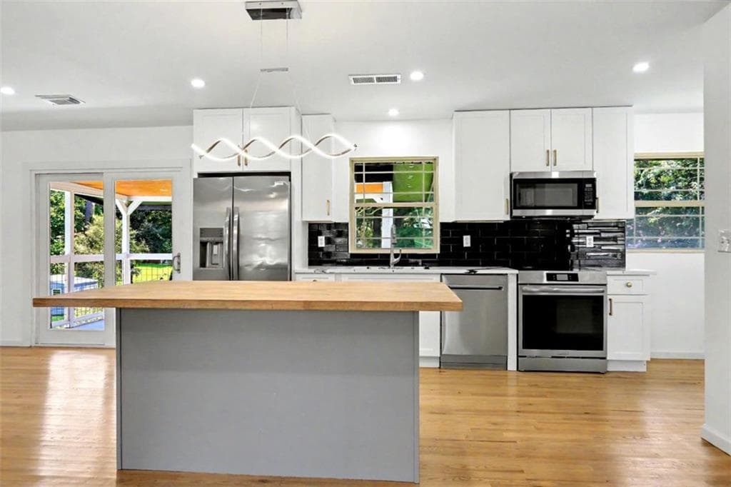 3 bedroom, 2 bathroom single family residence for sale at 6260 Walker Road, Riverdale, GA 30296 — photo 7
