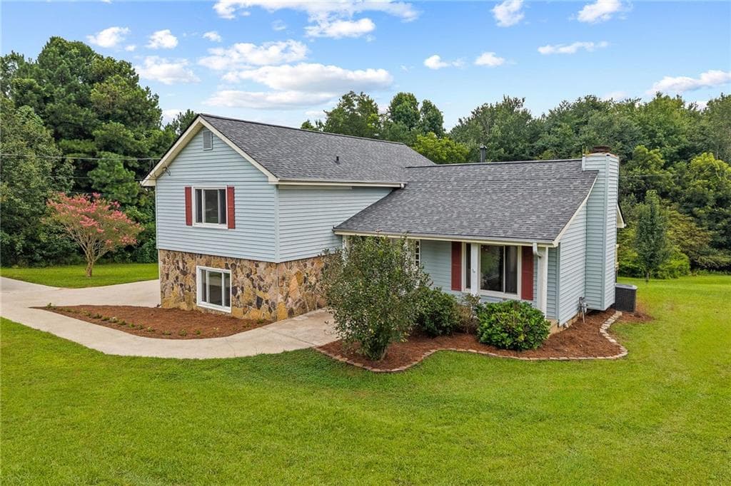 4 bedroom, 3 bathroom, 2,248 sq ft single family residence for sale at 3408 Hamilton Mill Road, Buford, GA 30519 — photo 2