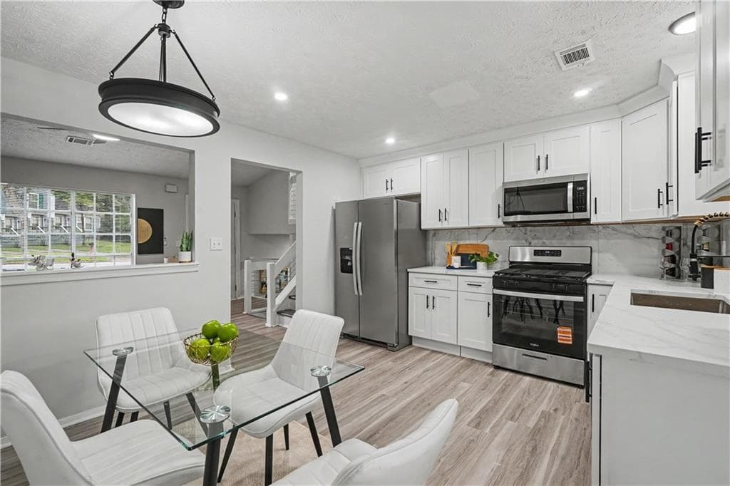 3 bedroom, 2 bathroom, 1,382 sq ft single family residence for sale at 4584 Garden Hills Drive, Stone Mountain, GA 30083 — photo 6