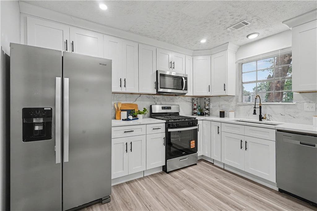 3 bedroom, 2 bathroom, 1,382 sq ft single family residence for sale at 4584 Garden Hills Drive, Stone Mountain, GA 30083 — photo 5