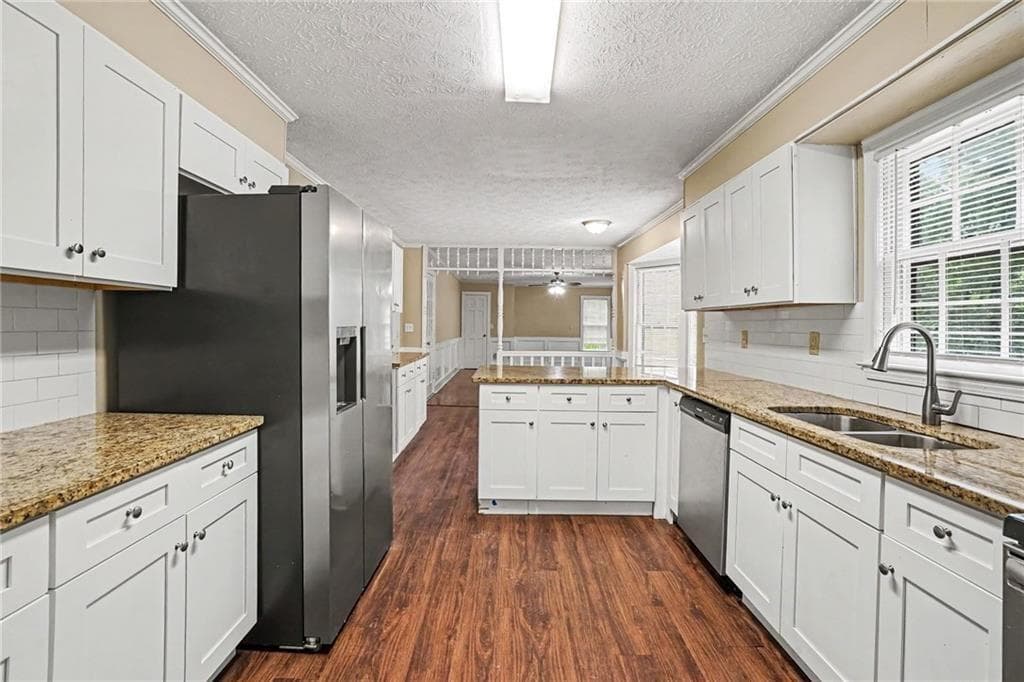 5 bedroom, 3 bathroom, 3,418 sq ft single family residence for sale at 3884 Hunting Ridge Drive, Lilburn, GA 30047 — photo 8
