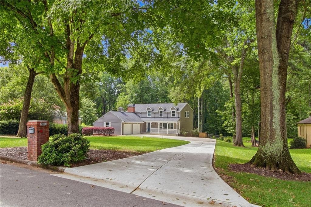 7 bedroom, 4 bathroom, 4,100 sq ft single family residence for sale at 2033 Hessian Court, Stone Mountain, GA 30087
