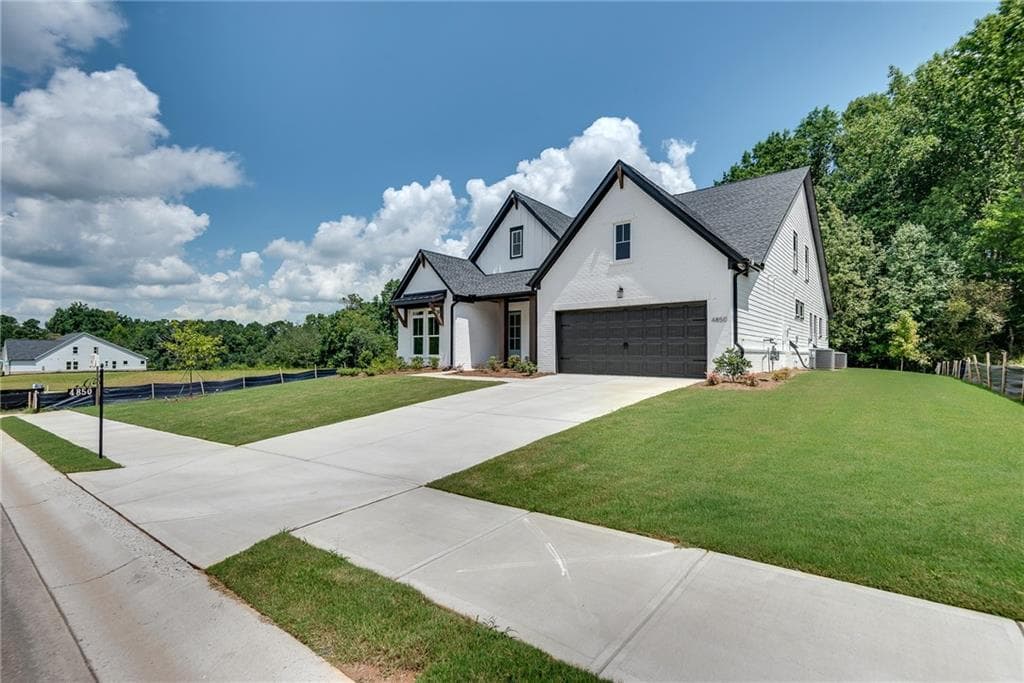 4 bedroom, 4 bathroom, 3,187 sq ft single family residence for sale at 4850 Gadwall Way, Cumming, GA 30028 — photo 4
