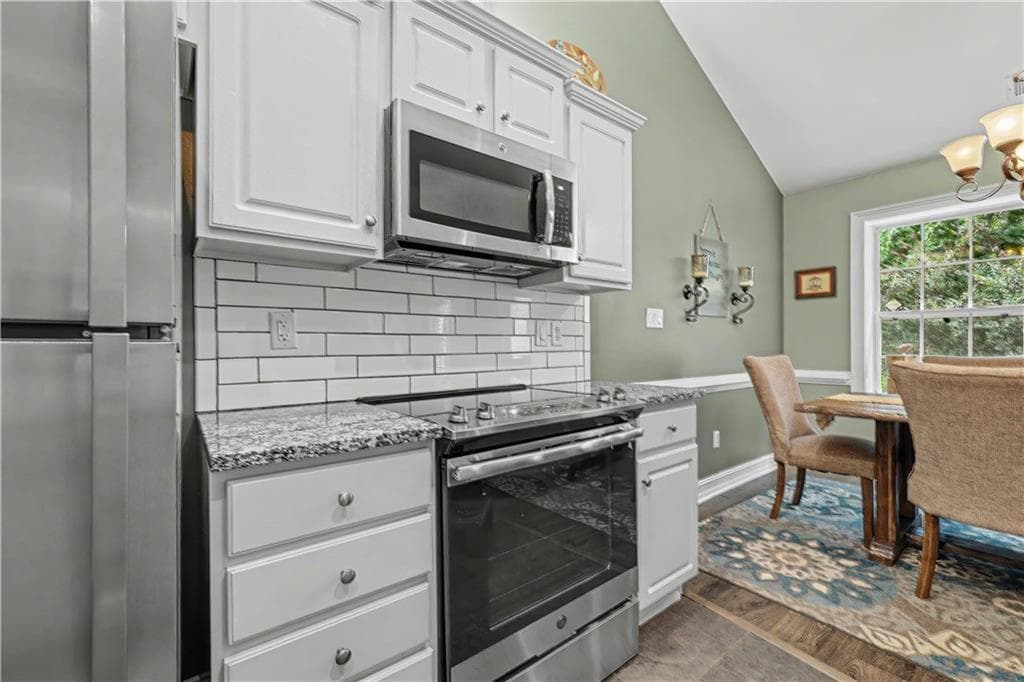 4 bedroom, 3 bathroom, 1,819 sq ft single family residence for sale at 2038 Wildcat Cliffs Lane, Lawrenceville, GA 30043 — photo 9