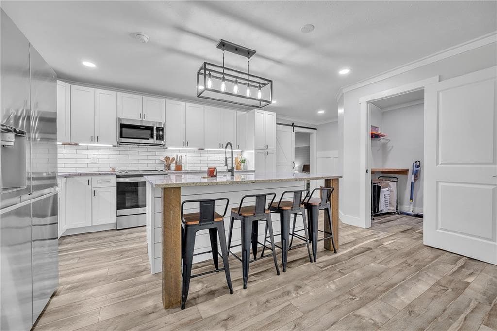 4 bedroom, 3 bathroom, 2,166 sq ft single family residence for sale at 410 Coleman Drive, Statham, GA 30666 — photo 5