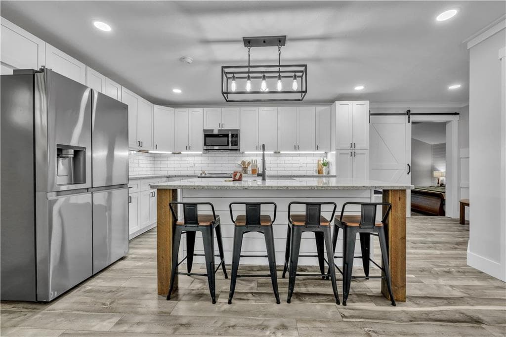 4 bedroom, 3 bathroom, 2,166 sq ft single family residence for sale at 410 Coleman Drive, Statham, GA 30666 — photo 4