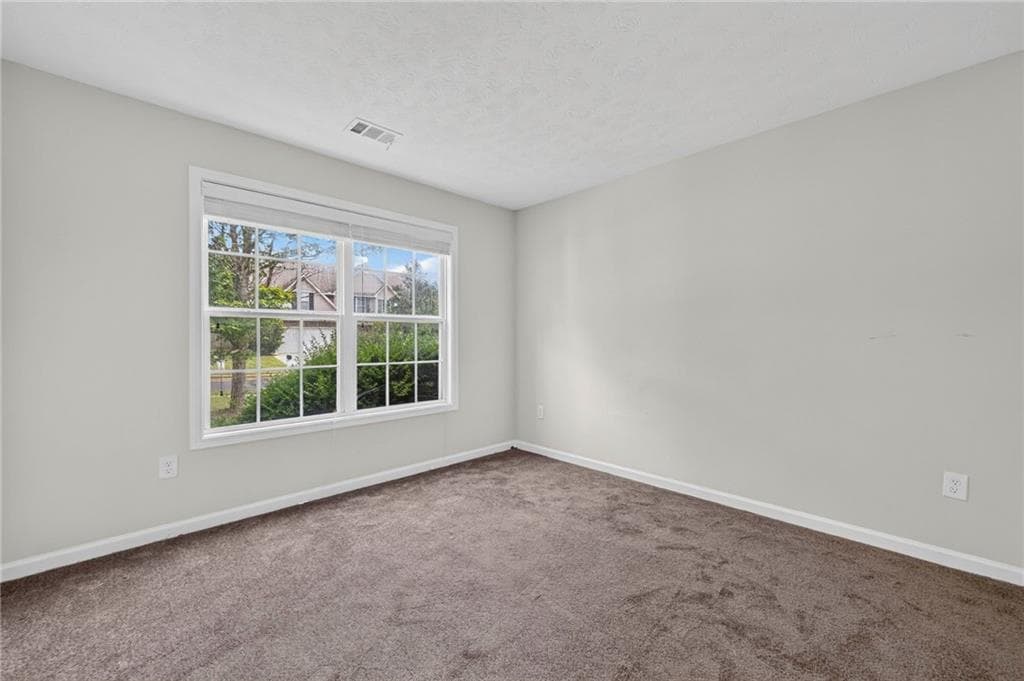 5 bedroom, 3 bathroom, 2,946 sq ft single family residence for sale at 3410 Garden Mist Circle, Auburn, GA 30011 — photo 9