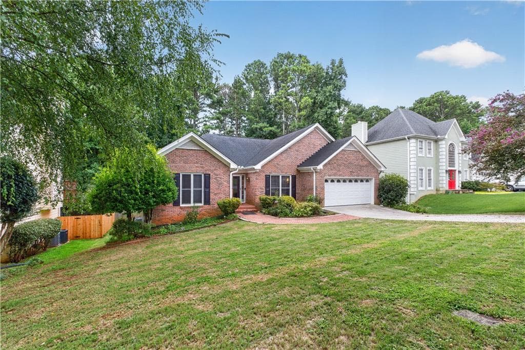 4 bedroom, 3 bathroom, 3,656 sq ft single family residence for sale at 1105 Secret Cove Drive, Buford, GA 30518 — photo 6