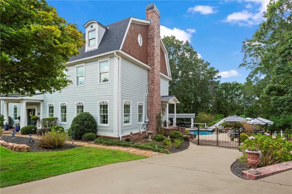8 bedroom, 7 bathroom, 9,036 sq ft single family residence for sale at 285 Old Hornage Road, Ball Ground, GA 30107 — photo 6