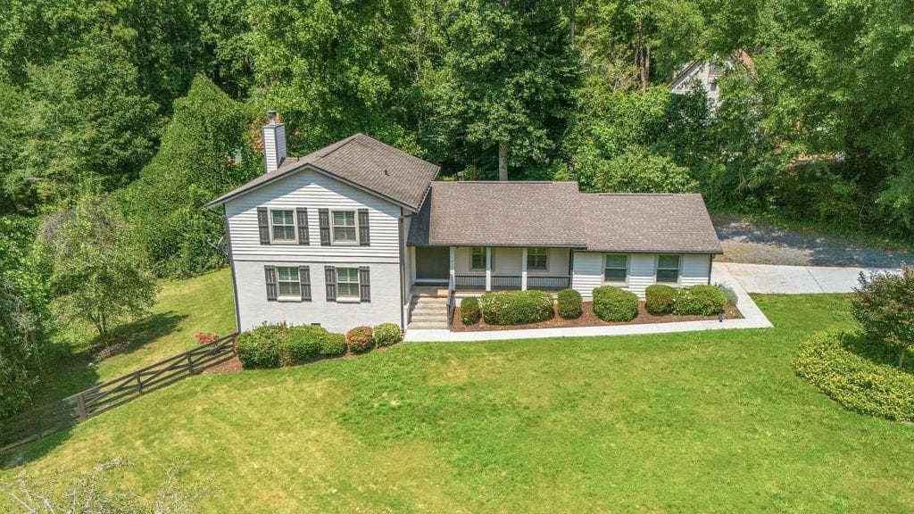 5 bedroom, 3 bathroom, 2,378 sq ft single family residence for sale at 9630 Pine Thicket Way, Roswell, GA 30075 — photo 1 of 29