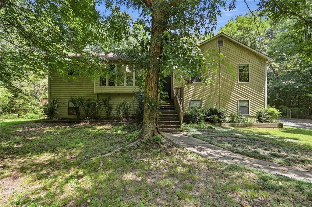 4 bedroom, 3 bathroom, 2,049 sq ft single family residence for sale at 819 Tramore Court, Powder Springs, GA 30127