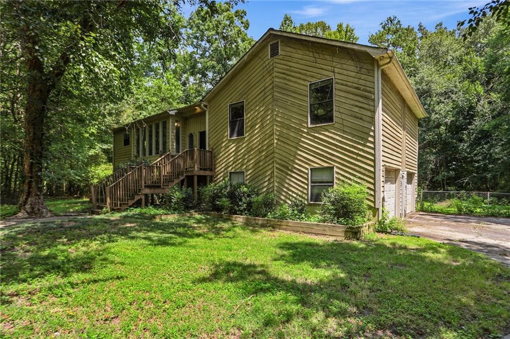 4 bedroom, 3 bathroom, 2,049 sq ft single family residence for sale at 819 Tramore Court, Powder Springs, GA 30127 — photo 2