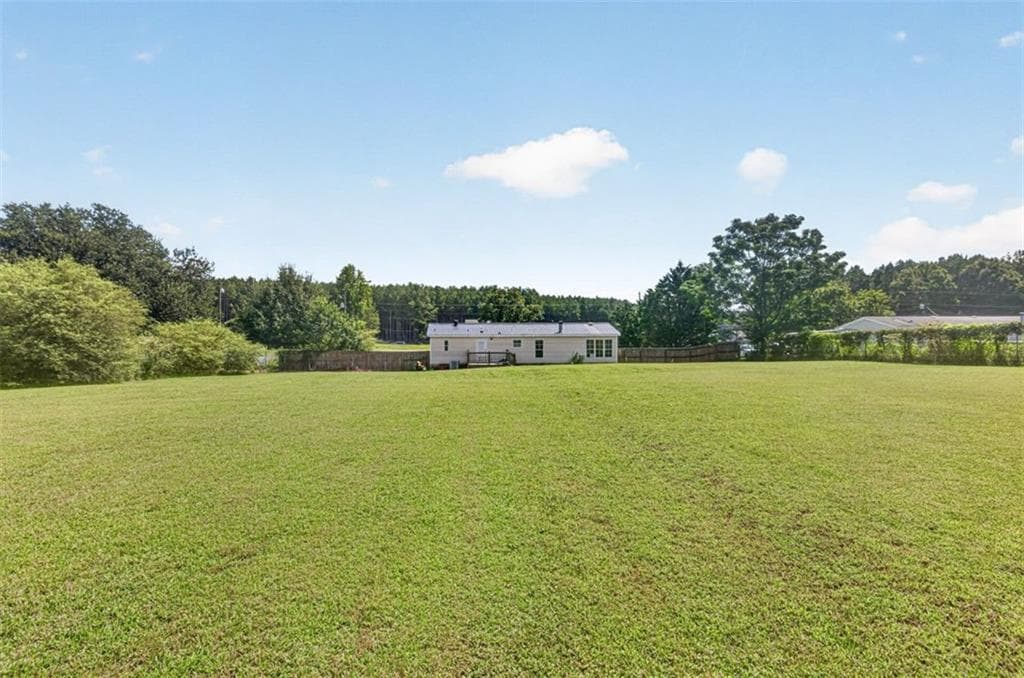3 bedroom, 2 bathroom, 1,500 sq ft single family residence for sale at 830 Cattle Barn Road, Monroe, GA 30655 — photo 2