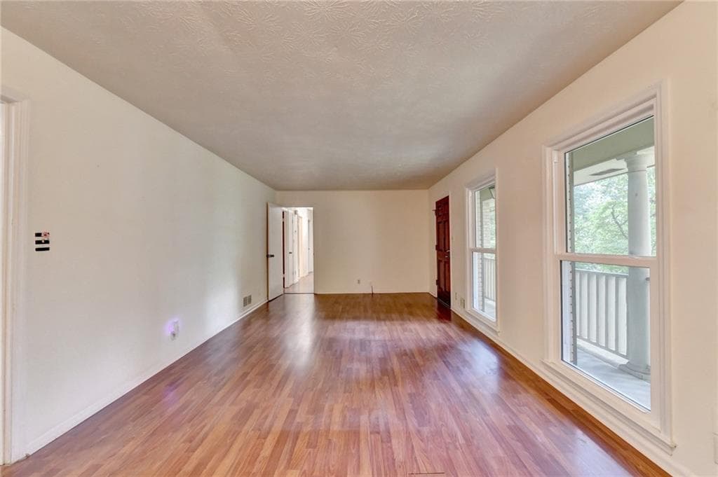 3 bedroom, 2 bathroom, 1,556 sq ft single family residence for sale at 1138 Woodland Circle, Lawrenceville, GA 30043 — photo 6