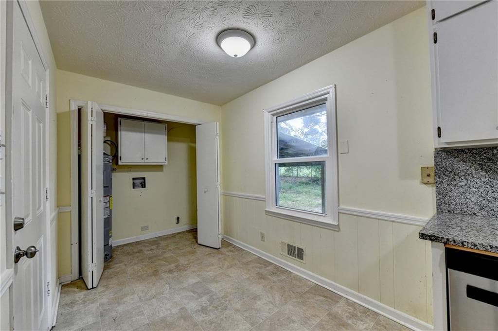 3 bedroom, 2 bathroom, 1,556 sq ft single family residence for sale at 1138 Woodland Circle, Lawrenceville, GA 30043 — photo 10