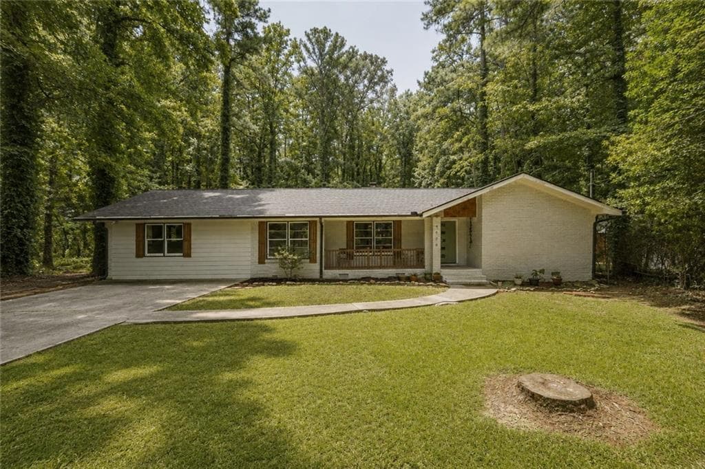4 bedroom, 3 bathroom, 2,400 sq ft single family residence for sale at 4670 Kelden Circle, Atlanta, GA 30349 — photo 1 of 38