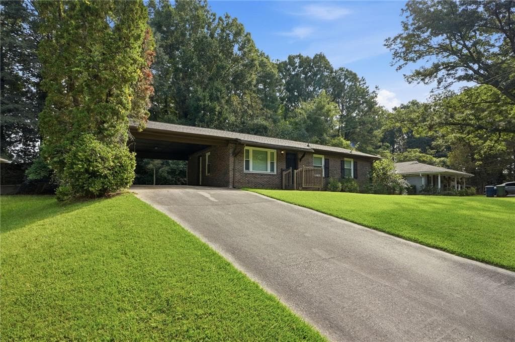3 bedroom, 2 bathroom, 1,075 sq ft single family residence for sale at 928 Magna Carta Drive, Atlanta, GA 30318 — photo 3
