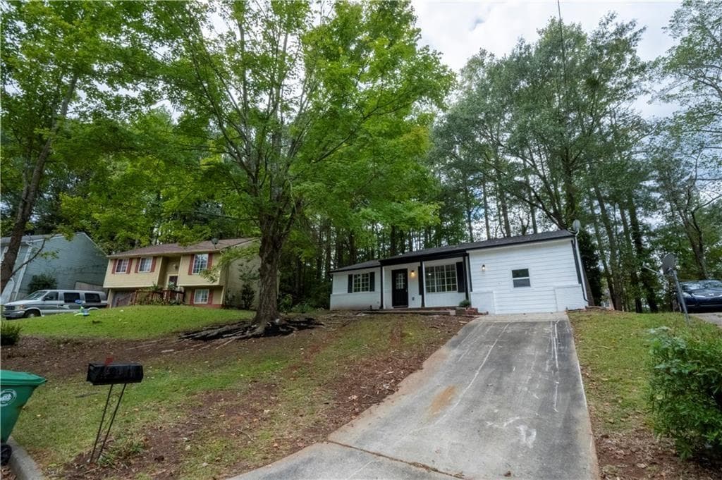 4 bedroom, 3 bathroom, 1,272 sq ft single family residence for sale at 1995 Northerly Way, Stone Mountain, GA 30088 — photo 1 of 27