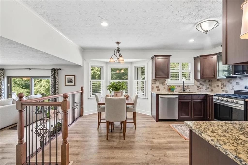 5 bedroom, 3 bathroom, 2,378 sq ft single family residence for sale at 9630 Pine Thicket Way, Roswell, GA 30075 — photo 8