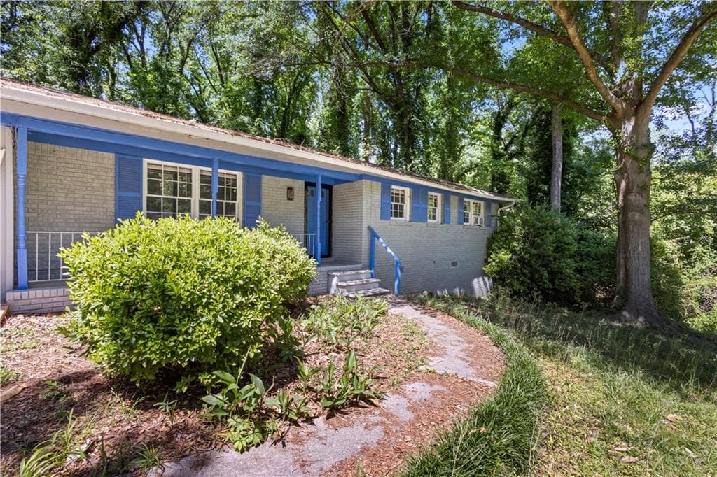 4 bedroom, 2 bathroom, 1,422 sq ft single family residence for sale at 4176 Indian Forest Road, Stone Mountain, GA 30083 — photo 2