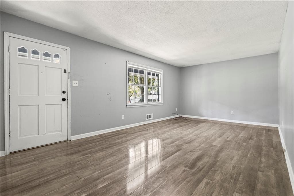 4 bedroom, 2 bathroom, 1,422 sq ft single family residence for sale at 4176 Indian Forest Road, Stone Mountain, GA 30083 — photo 3