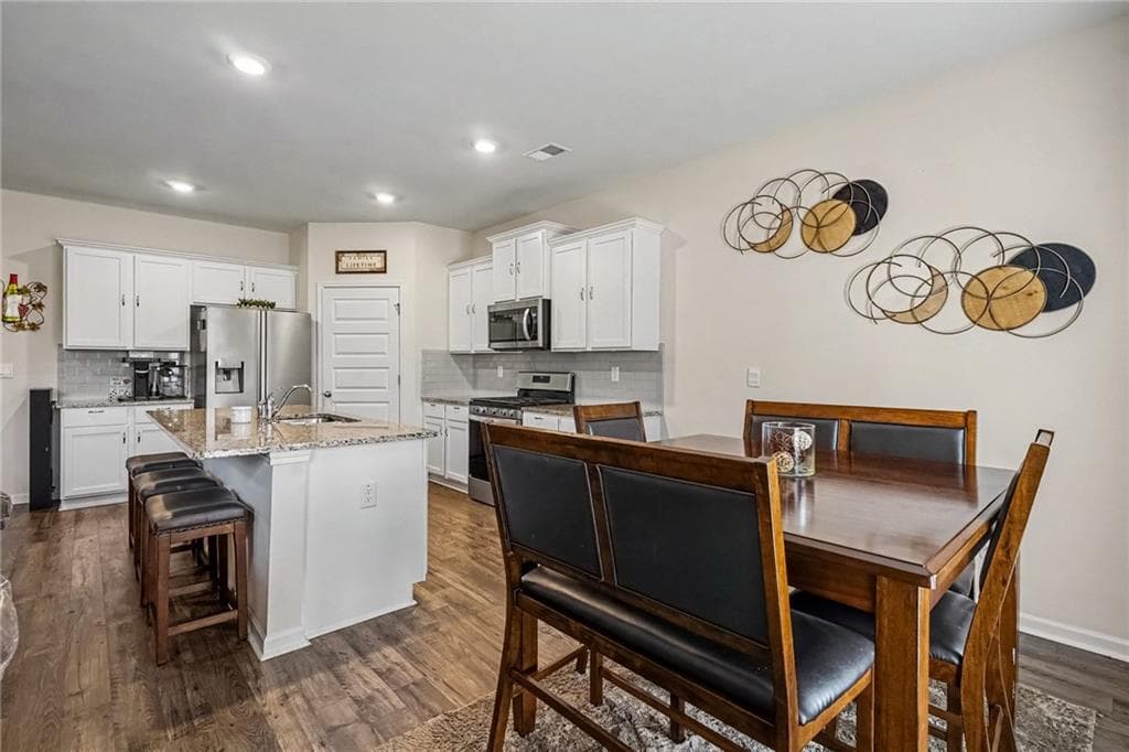 5 bedroom, 3 bathroom, 2,562 sq ft single family residence for sale at 3462 Hawthorn Farm Boulevard, Loganville, GA 30052 — photo 4