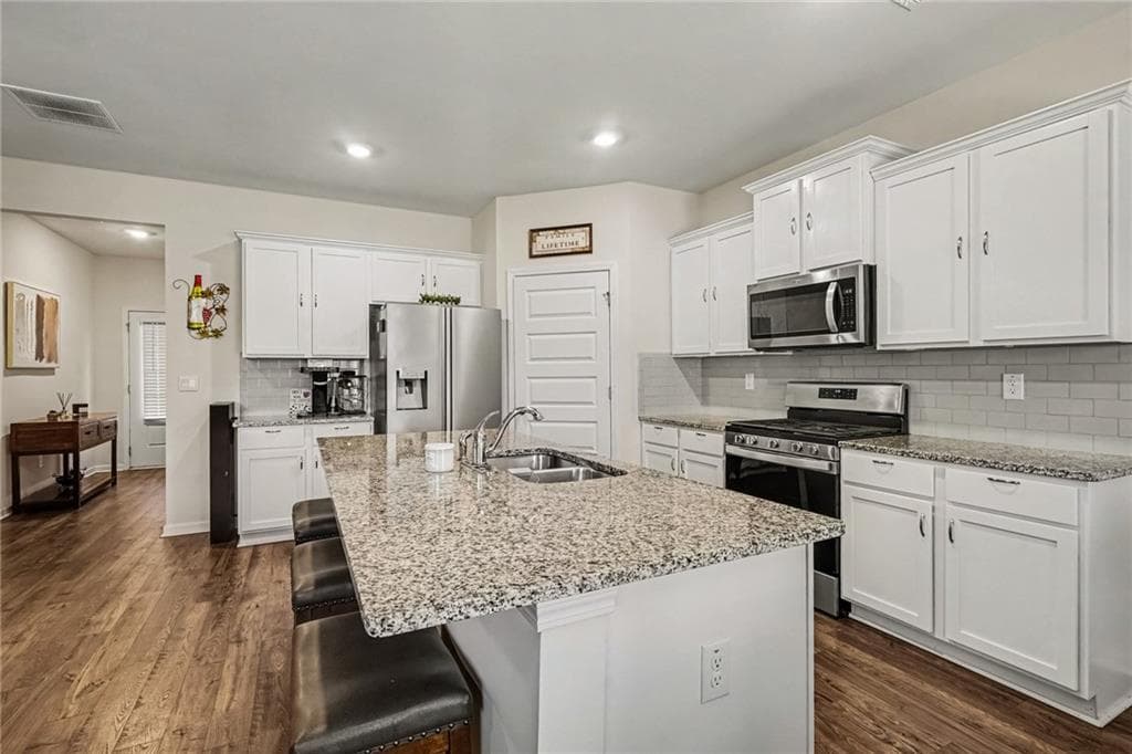 5 bedroom, 3 bathroom, 2,562 sq ft single family residence for sale at 3462 Hawthorn Farm Boulevard, Loganville, GA 30052 — photo 5