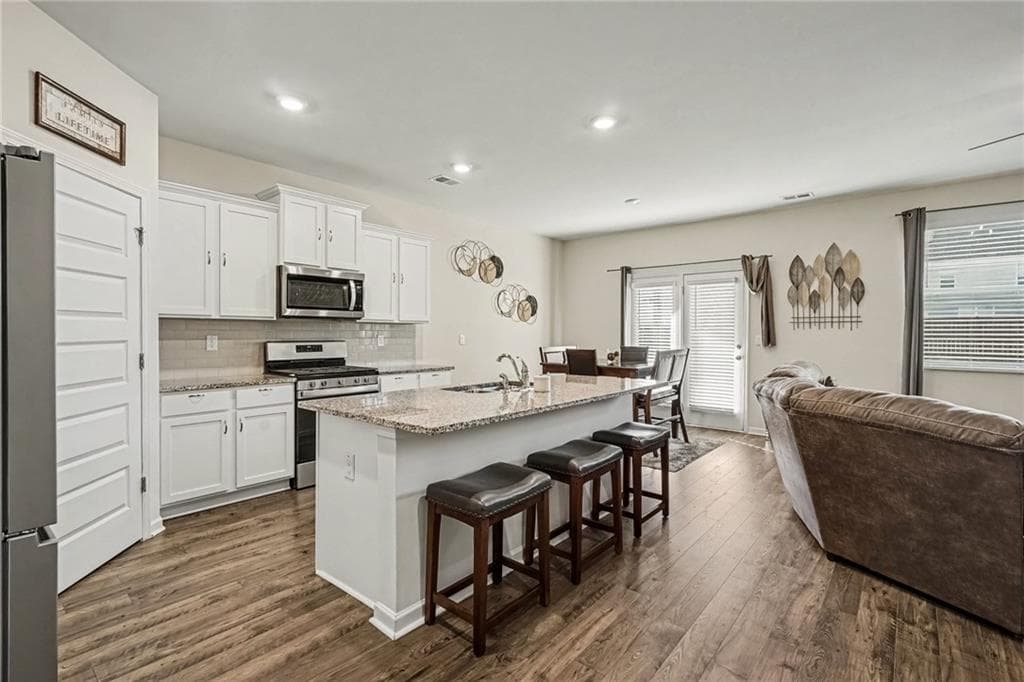 5 bedroom, 3 bathroom, 2,562 sq ft single family residence for sale at 3462 Hawthorn Farm Boulevard, Loganville, GA 30052 — photo 6