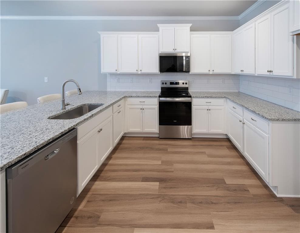 3 bedroom, 3 bathroom, 2,050 sq ft townhouse for sale at 5509 Leyland Drive, Flowery Branch, GA 30542 — photo 2