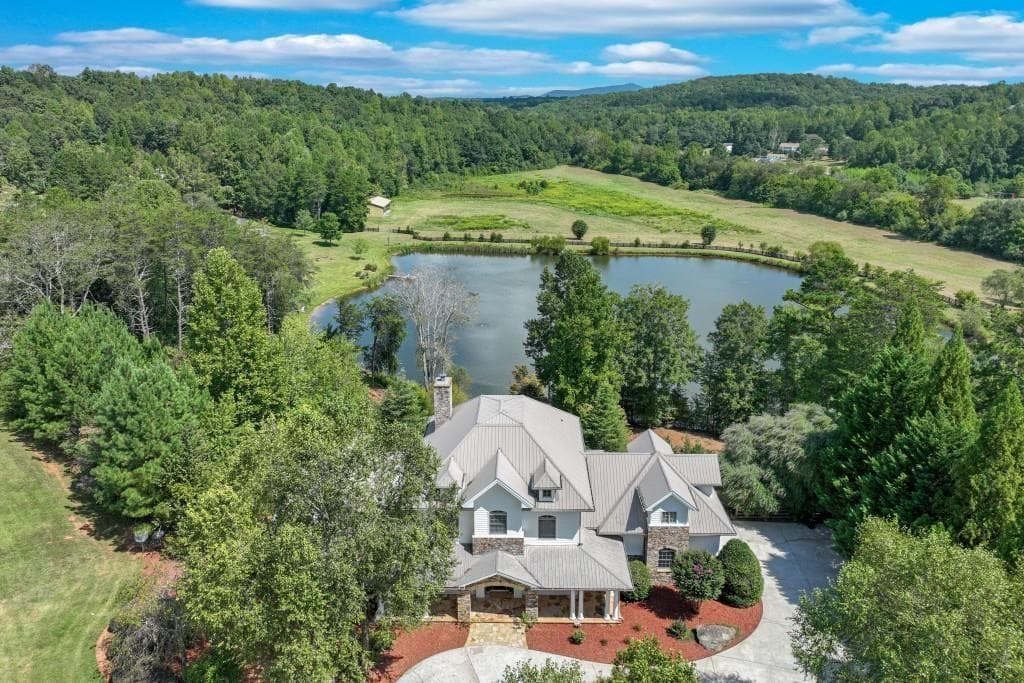 6 bedroom, 7 bathroom, 6,600 sq ft single family residence for sale at 6303 Ben Parks Road, Murrayville, GA 30564