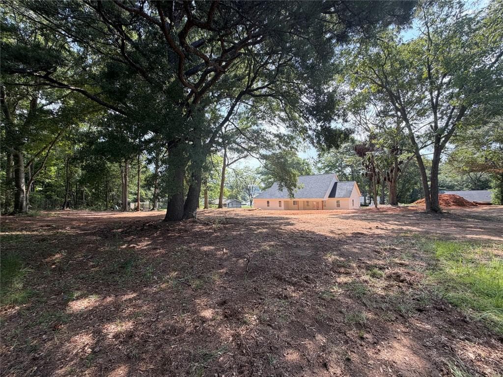 3 bedroom, 3 bathroom, 2,020 sq ft single family residence for sale at 207 Walton Street, Loganville, GA 30052 — photo 6