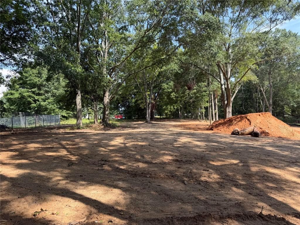 3 bedroom, 3 bathroom, 2,020 sq ft single family residence for sale at 207 Walton Street, Loganville, GA 30052 — photo 8