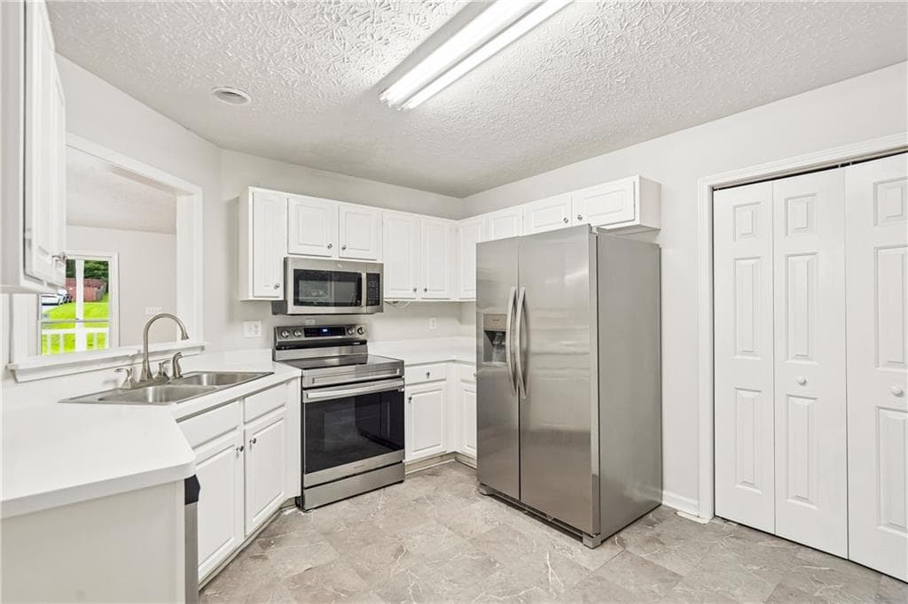 4 bedroom, 2 bathroom, 2,459 sq ft single family residence for sale at 484 Legacy Park Drive, Powder Springs, GA 30127 — photo 2