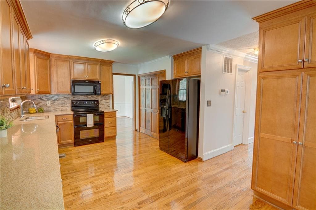 4 bedroom, 3 bathroom, 2,118 sq ft single family residence for sale at 4601 Jones Bridge Circle, Peachtree Corners, GA 30092 — photo 5
