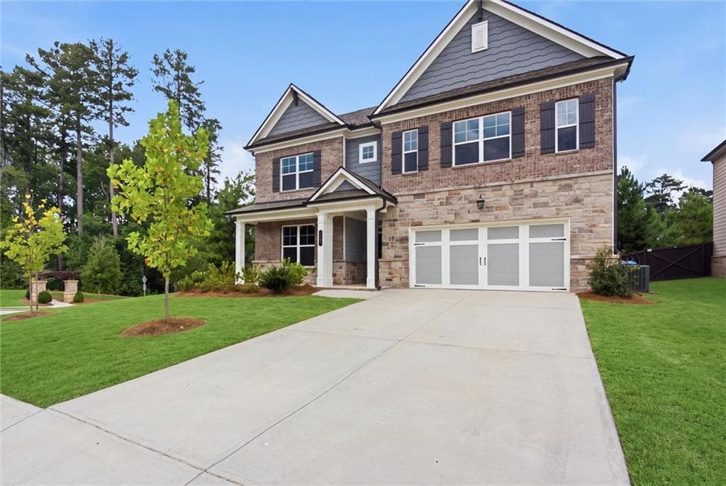 5 bedroom, 4 bathroom, 3,722 sq ft single family residence for sale at 1503 Dover Creek Lane, Lawrenceville, GA 30045 — photo 2