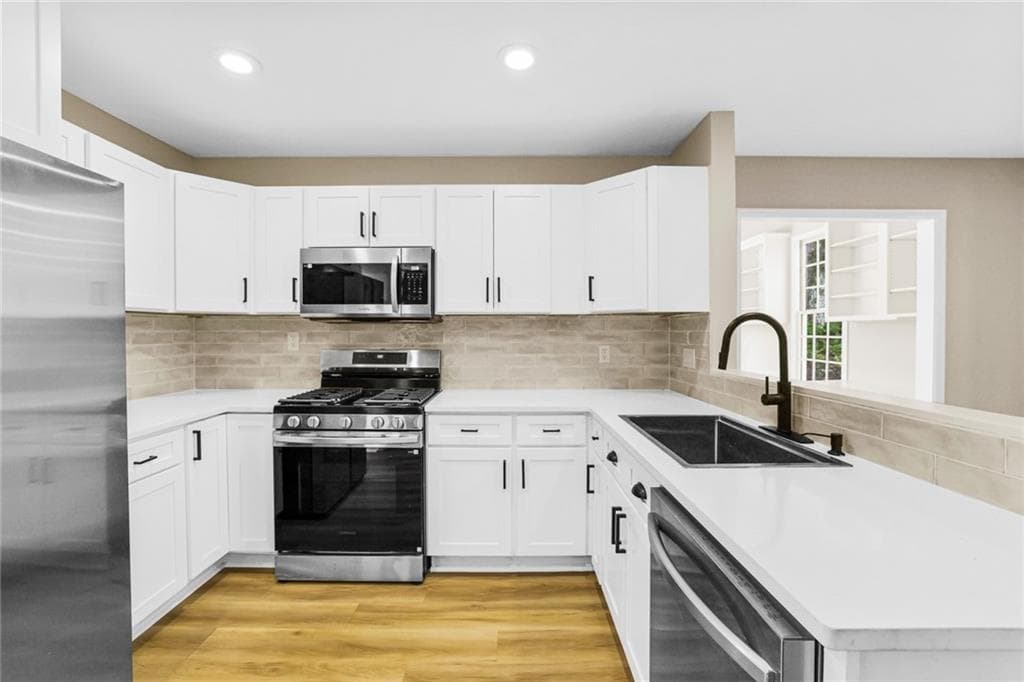 4 bedroom, 3 bathroom, 2,555 sq ft single family residence for sale at 4335 Abbotts Pointe Court, Duluth, GA 30097 — photo 9