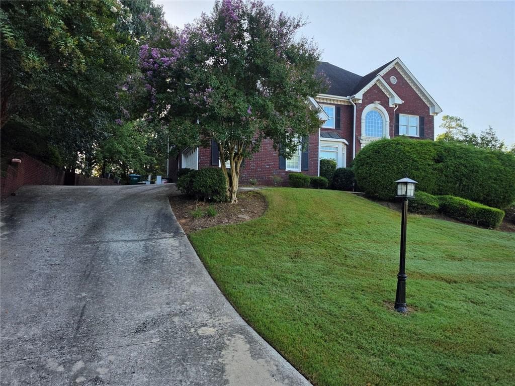 6 bedroom, 5 bathroom, 5,711 sq ft single family residence for sale at 2810 Shoemaker Lane, Snellville, GA 30039 — photo 2