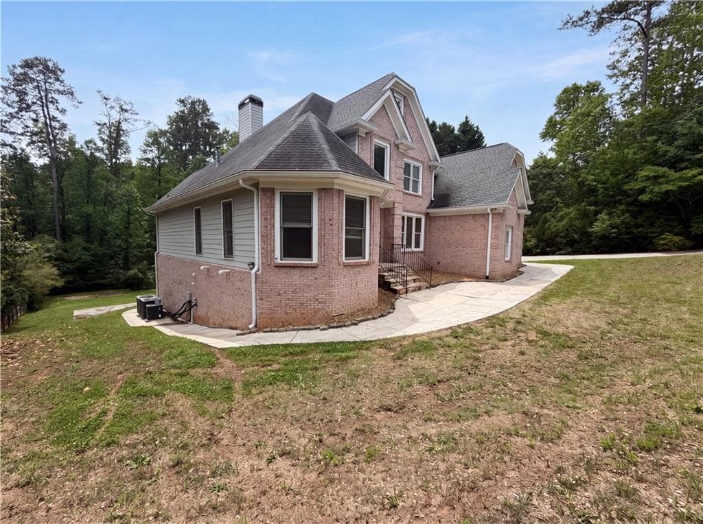 6 bedroom, 6 bathroom, 6,500 sq ft single family residence for sale at 4710 Roswell Road, Marietta, GA 30062 — photo 2