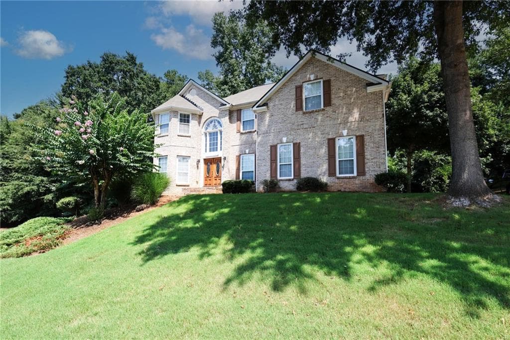 4 bedroom, 3 bathroom, 2,940 sq ft single family residence for sale at 1105 Fountain Crest Drive, Conyers, GA 30013 — photo 1 of 48