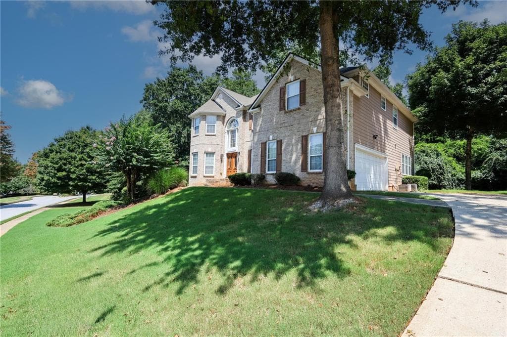 4 bedroom, 3 bathroom, 2,940 sq ft single family residence for sale at 1105 Fountain Crest Drive, Conyers, GA 30013 — photo 2