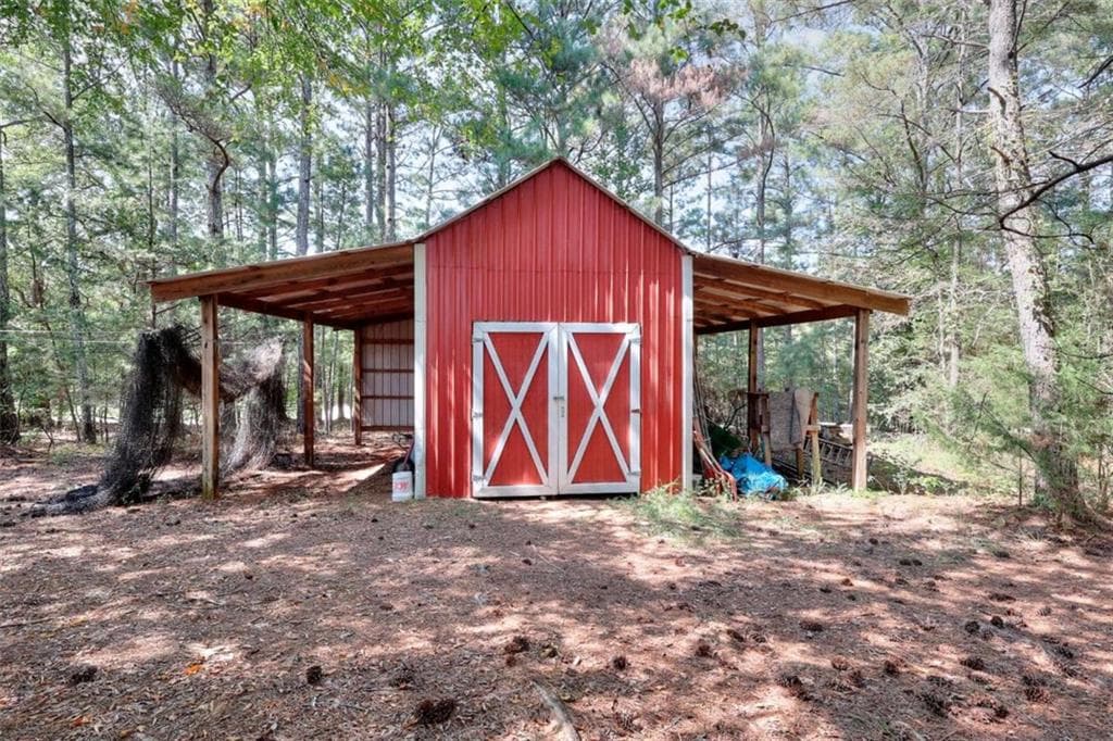 4 bedroom, 3 bathroom, 2,560 sq ft single family residence for sale at 25 Browning Shoals Road, Social Circle, GA 30025 — photo 2